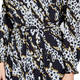 GEORGEDÉ ABSTRACT ANIMAL PRINT JERSEY DRESS