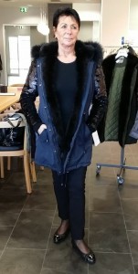 blue puffa with sequin sleeves